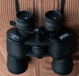 Binocular óptica